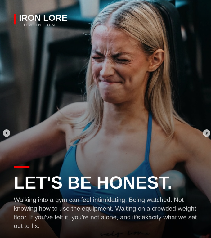 Woman lifting weights at Iron Lore Gym